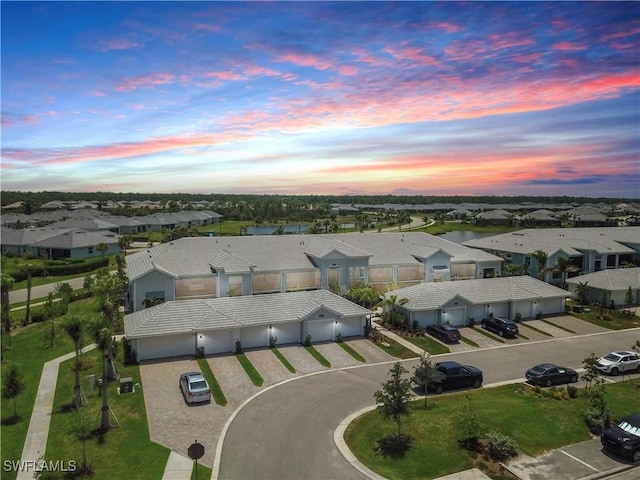 14257 Heritage Landing Blvd Unit 1122, Punta Gorda, FL 33995 - aerial view at dusk of a residential view and a water view