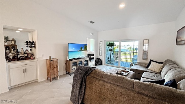 14257 Heritage Landing Blvd Unit 1122, Punta Gorda, FL 33995 - living room with light tile patterned floors and high vaulted ceiling