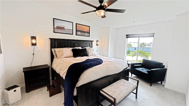14257 Heritage Landing Blvd Unit 1122, Punta Gorda, FL 33995 - bedroom with light carpet, lofted ceiling, baseboards, and a ceiling fan