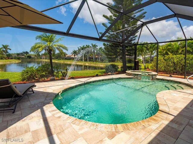 3913 Sapphire Way, Naples, FL 34114 - view of pool with a patio area, a water view, a pool with connected hot tub, and glass enclosure