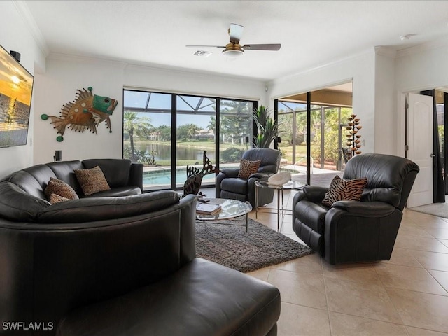 3913 Sapphire Way, Naples, FL 34114 - living room with light tile patterned floors, ornamental molding, ceiling fan, and a water view
