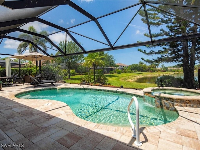 3913 Sapphire Way, Naples, FL 34114 - view of swimming pool with a patio area, a pool with connected hot tub, a lanai, and a water view