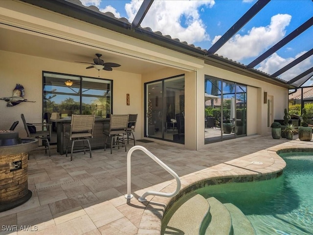 3913 Sapphire Way, Naples, FL 34114 - rear view of house with stucco siding and a patio