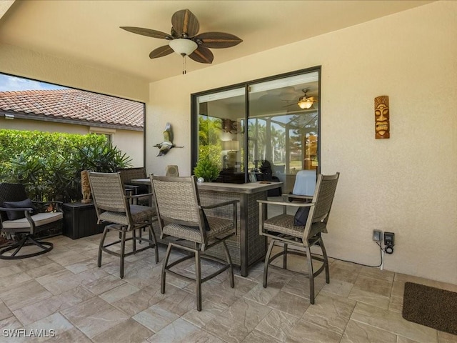 3913 Sapphire Way, Naples, FL 34114 - view of patio featuring a ceiling fan and outdoor dining space