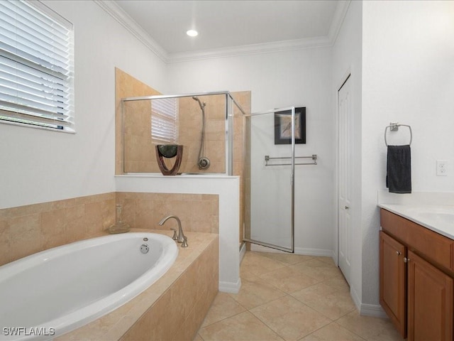 3913 Sapphire Way, Naples, FL 34114 - bathroom featuring a garden tub, a shower stall, vanity, crown molding, and tile patterned flooring