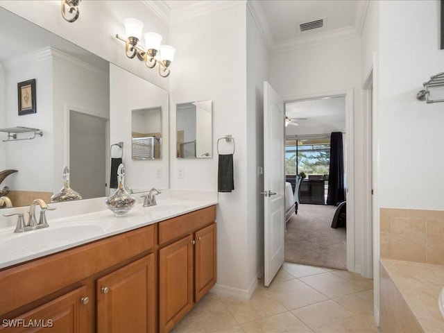 3913 Sapphire Way, Naples, FL 34114 - full bath with double vanity, a relaxing tiled tub, ornamental molding, tile patterned flooring, and a ceiling fan