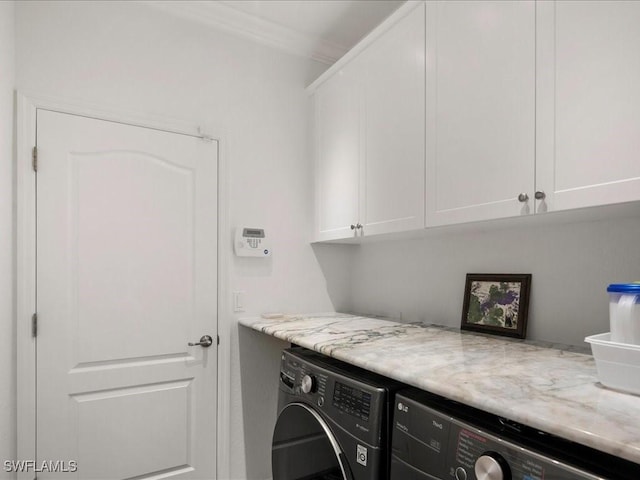 3913 Sapphire Way, Naples, FL 34114 - laundry area featuring washer and clothes dryer, cabinet space, and crown molding