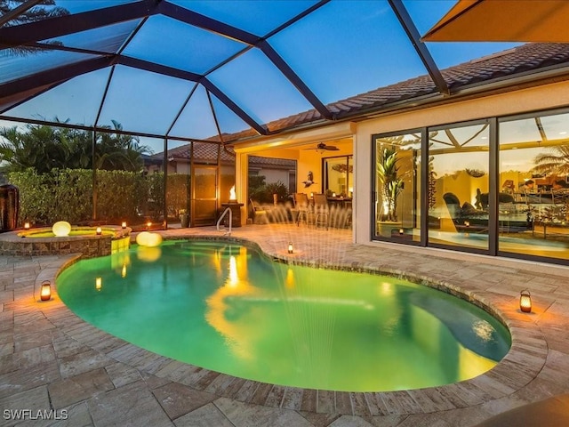 3913 Sapphire Way, Naples, FL 34114 - view of swimming pool featuring a patio area, ceiling fan, glass enclosure, and a pool with connected hot tub