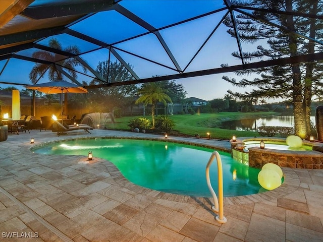 3913 Sapphire Way, Naples, FL 34114 - view of pool featuring a patio area, a water view, a pool with connected hot tub, and a lanai