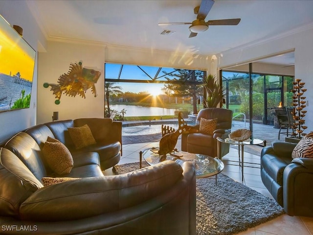 3913 Sapphire Way, Naples, FL 34114 - tiled living room featuring a ceiling fan, ornamental molding, and a water view