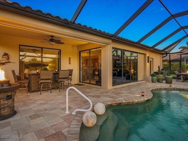 3913 Sapphire Way, Naples, FL 34114 - outdoor pool with a patio area, a lanai, a ceiling fan, and outdoor dining area