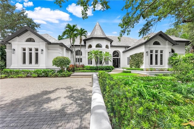 4111 Harbor Oaks Ct, Bonita Springs, FL 34134 - rear view of property featuring french doors and stucco siding