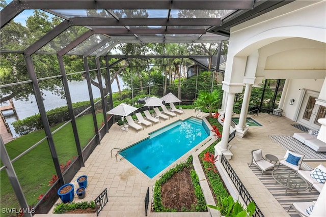 4111 Harbor Oaks Ct, Bonita Springs, FL 34134 - community pool with a water view, a patio, and glass enclosure