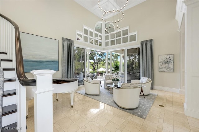 4111 Harbor Oaks Ct, Bonita Springs, FL 34134 - living area featuring a chandelier and a towering ceiling