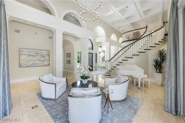 4111 Harbor Oaks Ct, Bonita Springs, FL 34134 - entryway with stairs, coffered ceiling, a chandelier, beam ceiling, and a towering ceiling