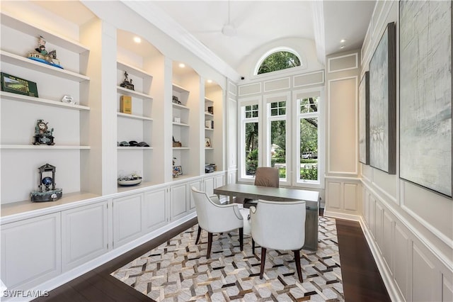4111 Harbor Oaks Ct, Bonita Springs, FL 34134 - dining space featuring built in shelves, a decorative wall, dark wood finished floors, vaulted ceiling, and a desk