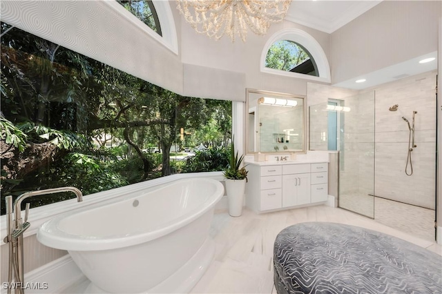 4111 Harbor Oaks Ct, Bonita Springs, FL 34134 - bathroom with a walk in shower, vanity, a soaking tub, a chandelier, and crown molding