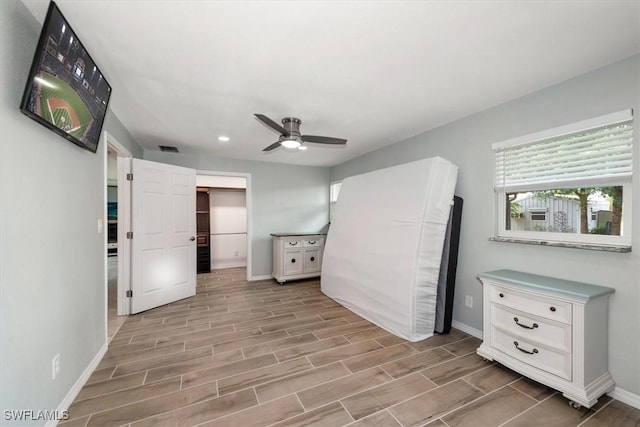 13951 Rod And Gun Club Rd, Fort Myers, FL 33913 - unfurnished bedroom with baseboards, wood finish floors, recessed lighting, and ceiling fan