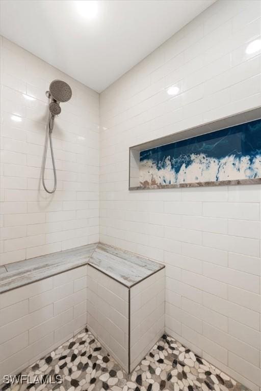 13951 Rod And Gun Club Rd, Fort Myers, FL 33913 - bathroom with a tile shower, tile walls, and tile patterned floors