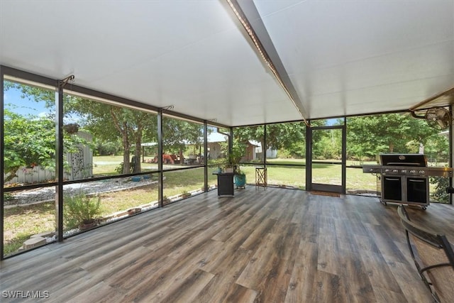 13951 Rod And Gun Club Rd, Fort Myers, FL 33913 - unfurnished sunroom with wood finished floors and floor to ceiling windows