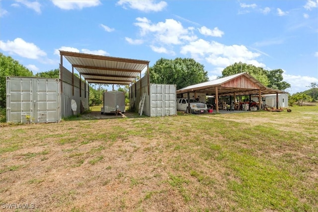 13951 Rod And Gun Club Rd, Fort Myers, FL 33913 - view of vehicle parking featuring a detached carport and driveway