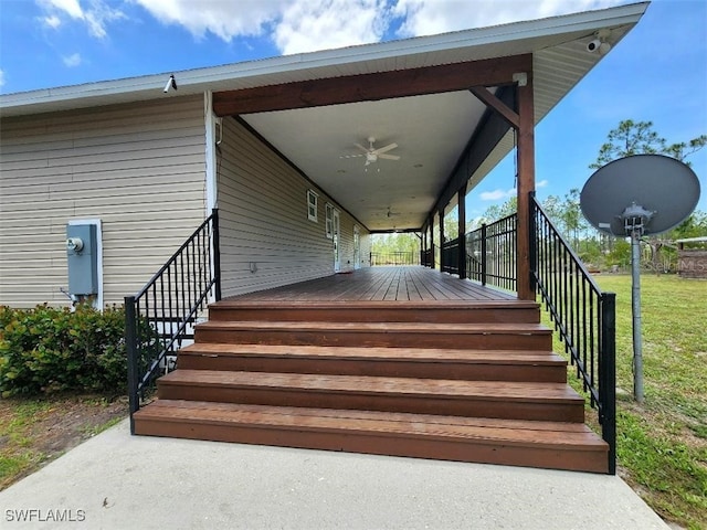 6405 Alan Blvd, Punta Gorda, FL 33982 - wooden deck with ceiling fan and a lawn