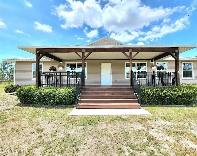 6405 Alan Blvd, Punta Gorda, FL 33982 - view of front of property with a front lawn