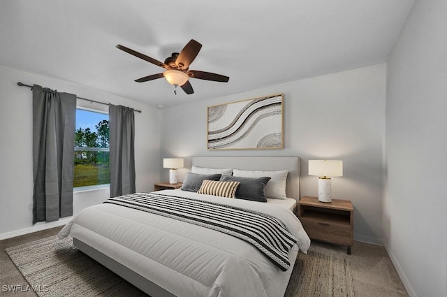 6405 Alan Blvd, Punta Gorda, FL 33982 - carpeted bedroom with baseboards and a ceiling fan