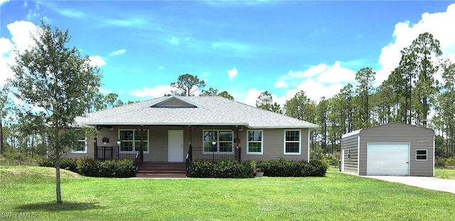 6405 Alan Blvd, Punta Gorda, FL 33982 - view of front facade featuring an outbuilding, covered porch, a detached garage, and a front lawn