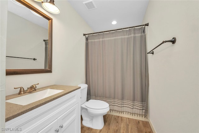 6405 Alan Blvd, Punta Gorda, FL 33982 - full bath featuring vanity, wood finished floors, recessed lighting, and curtained shower