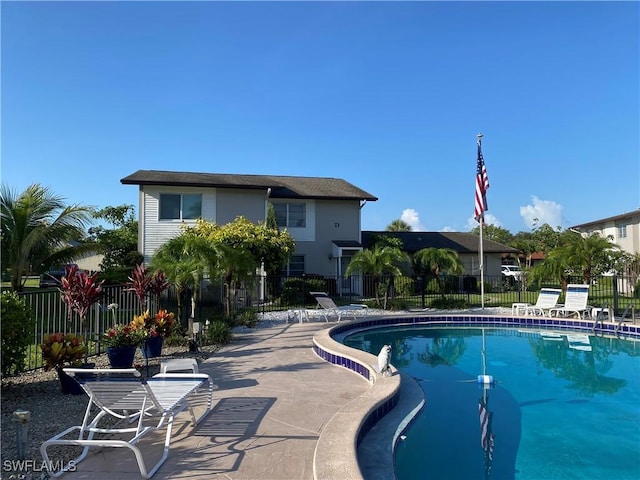 180 Cypress Way E Unit D124, Naples, FL 34110 - community pool with a patio