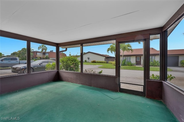 180 Cypress Way E Unit D124, Naples, FL 34110 - unfurnished sunroom with healthy amount of natural light