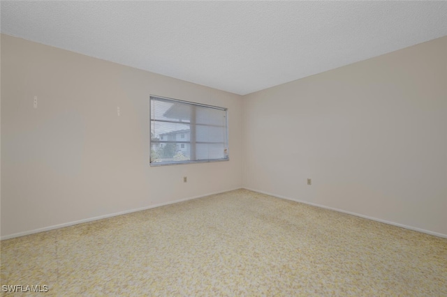 180 Cypress Way E Unit D124, Naples, FL 34110 - unfurnished room with carpet and baseboards