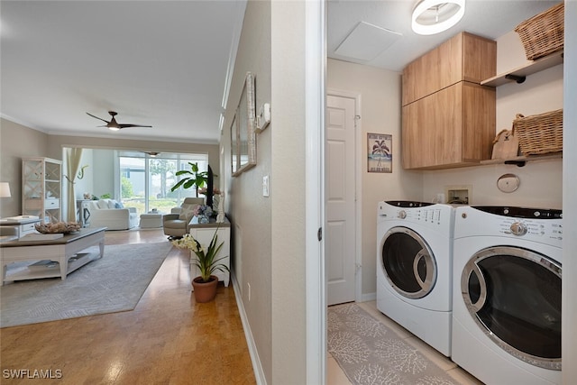 7058 Barrington Cir Unit 102, Naples, FL 34108 - washroom with cabinet space, independent washer and dryer, ceiling fan, ornamental molding, and baseboards
