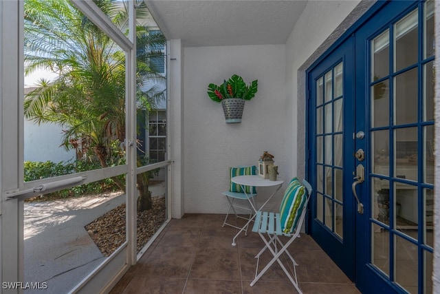 7058 Barrington Cir Unit 102, Naples, FL 34108 - balcony featuring french doors