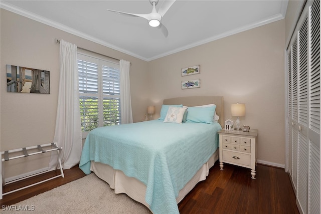 7058 Barrington Cir Unit 102, Naples, FL 34108 - bedroom with wood finished floors, a closet, crown molding, baseboards, and ceiling fan