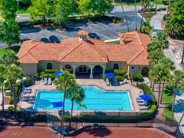 2722 Olde Cypress Dr, Naples, FL 34119 - aerial view of property and surrounding area featuring a pool area