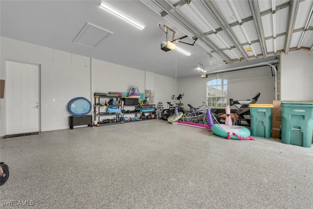 2722 Olde Cypress Dr, Naples, FL 34119 - garage with a garage door opener and electric panel