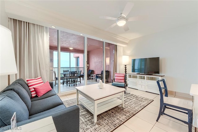 190 Estero Blvd Unit 303, Fort Myers Beach, FL 33931 - living area featuring ceiling fan, light tile patterned floors, and floor to ceiling windows