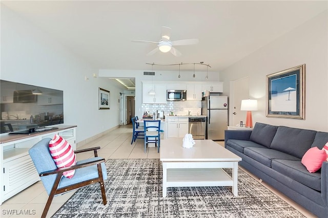 190 Estero Blvd Unit 303, Fort Myers Beach, FL 33931 - living area featuring ceiling fan, light tile patterned floors, and rail lighting