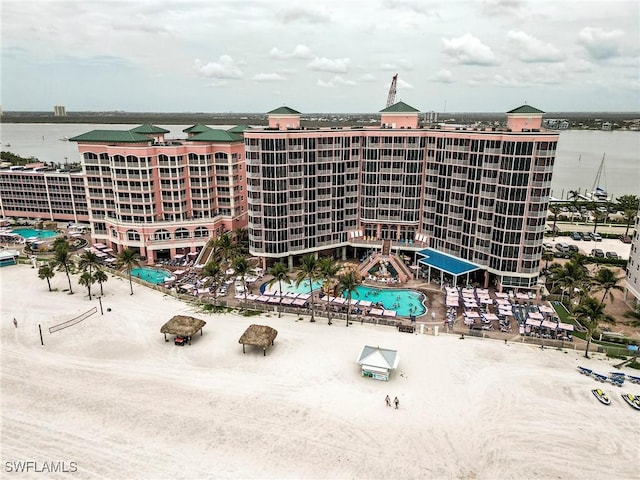 190 Estero Blvd Unit 303, Fort Myers Beach, FL 33931 - view of apartment building / complex with a water view and a community pool