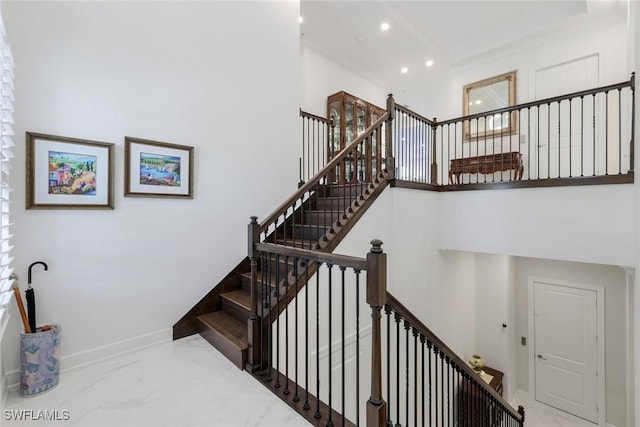 2488 Breakwater Way Unit 201, Naples, FL 34112 - stairs featuring recessed lighting, crown molding, marble finish floors, and a towering ceiling