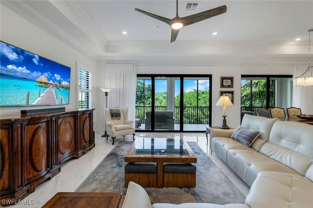 2488 Breakwater Way Unit 201, Naples, FL 34112 - living room featuring marble tiled flooring, crown molding, a ceiling fan, recessed lighting, and a chandelier
