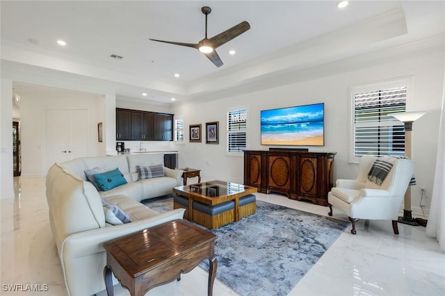 2488 Breakwater Way Unit 201, Naples, FL 34112 - living area with a tray ceiling, a ceiling fan, recessed lighting, and light marble finish flooring