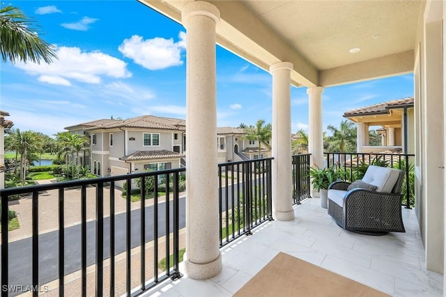 2488 Breakwater Way Unit 201, Naples, FL 34112 - balcony with a water view and a residential view