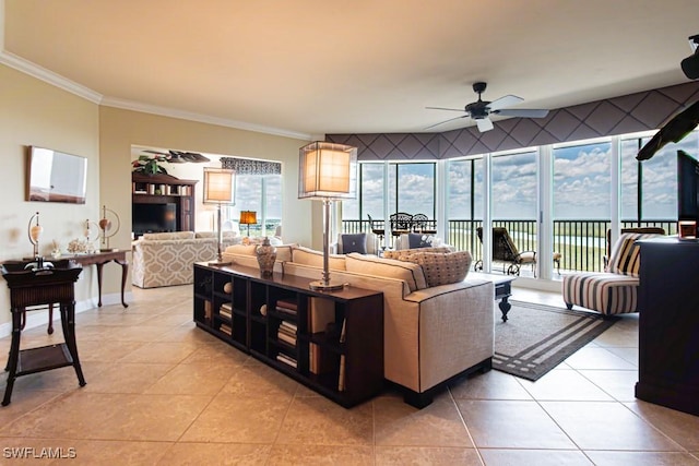 1050 Borghese Ln Unit 1101, Naples, FL 34114 - living area with ceiling fan, crown molding, light tile patterned flooring, and baseboards