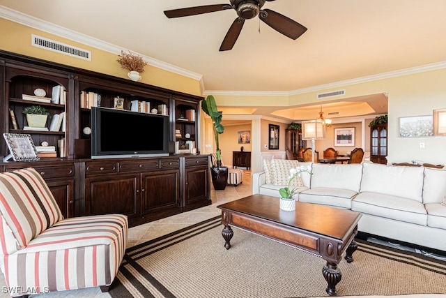 1050 Borghese Ln Unit 1101, Naples, FL 34114 - living room featuring ornamental molding, arched walkways, a ceiling fan, and light carpet