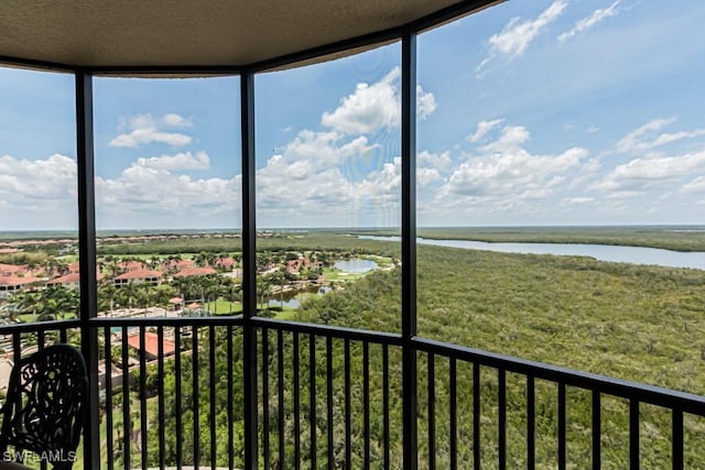1050 Borghese Ln Unit 1101, Naples, FL 34114 - unfurnished sunroom with a water view