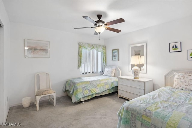 1010 SW 48th Ter Unit 102, Cape Coral, FL 33914 - carpeted bedroom with a ceiling fan and baseboards
