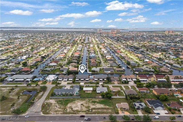 1010 SW 48th Ter Unit 102, Cape Coral, FL 33914 - aerial view of property and surrounding area with nearby suburban area and a nearby body of water